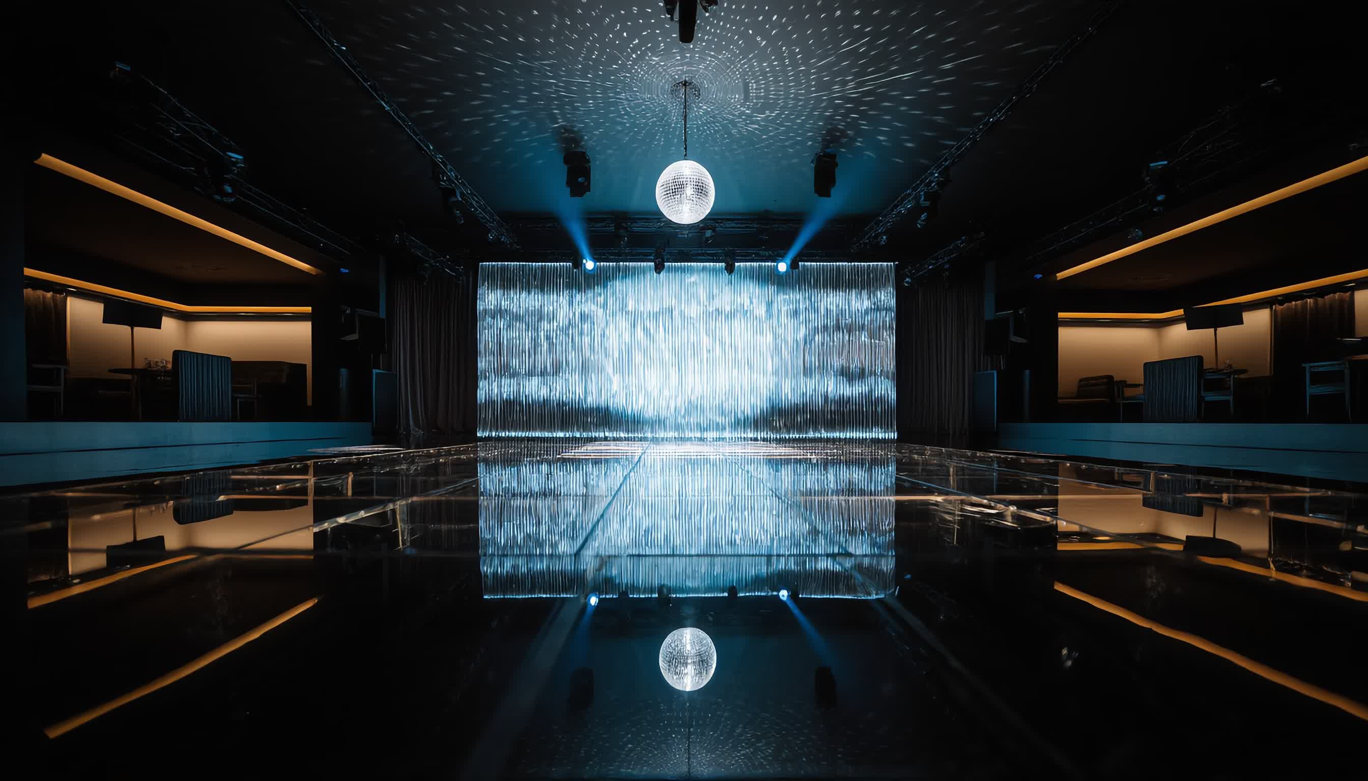 Transformed NYC venue space with mirror ball creating expansive visual environment