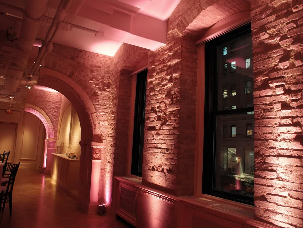 Custom wedding lighting rentals design with LED uplighting rental and string lights for wedding rental creating elegant ambiance